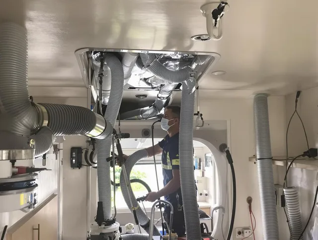 Foxborough Air Duct Cleaning specialist performing precise mobile home duct cleaning in Foxborough